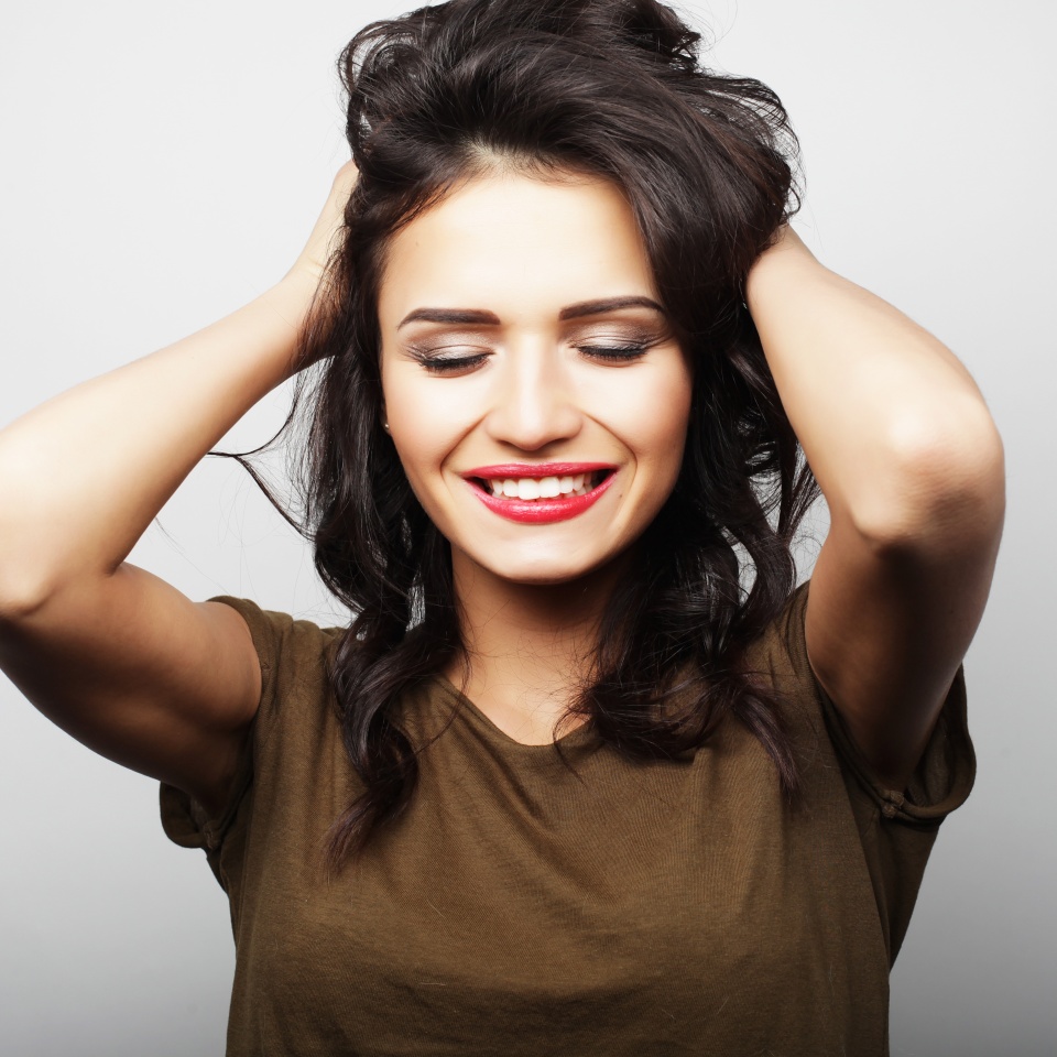 Beautiful young surprised woman.